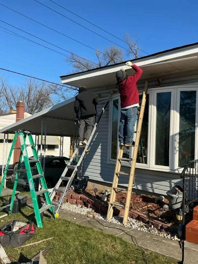 Restoration crew performing exterior repair in Raytown