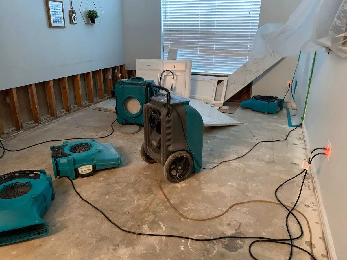 Dehumidifier in flood-cut room for Water Damage Restoration in Raytown
